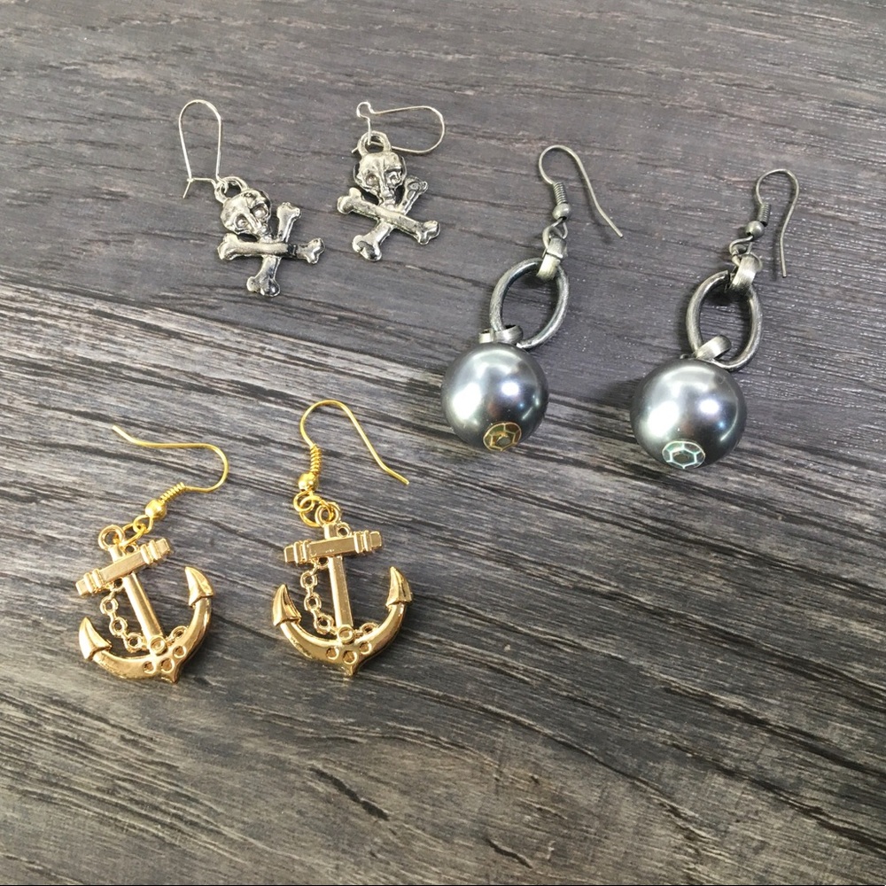 Three pairs of earrings.